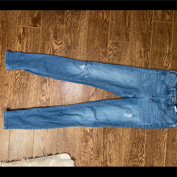 one side ripped jeans